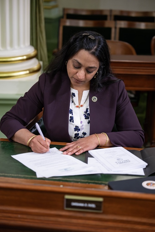 AD76 Patel at assembly desk